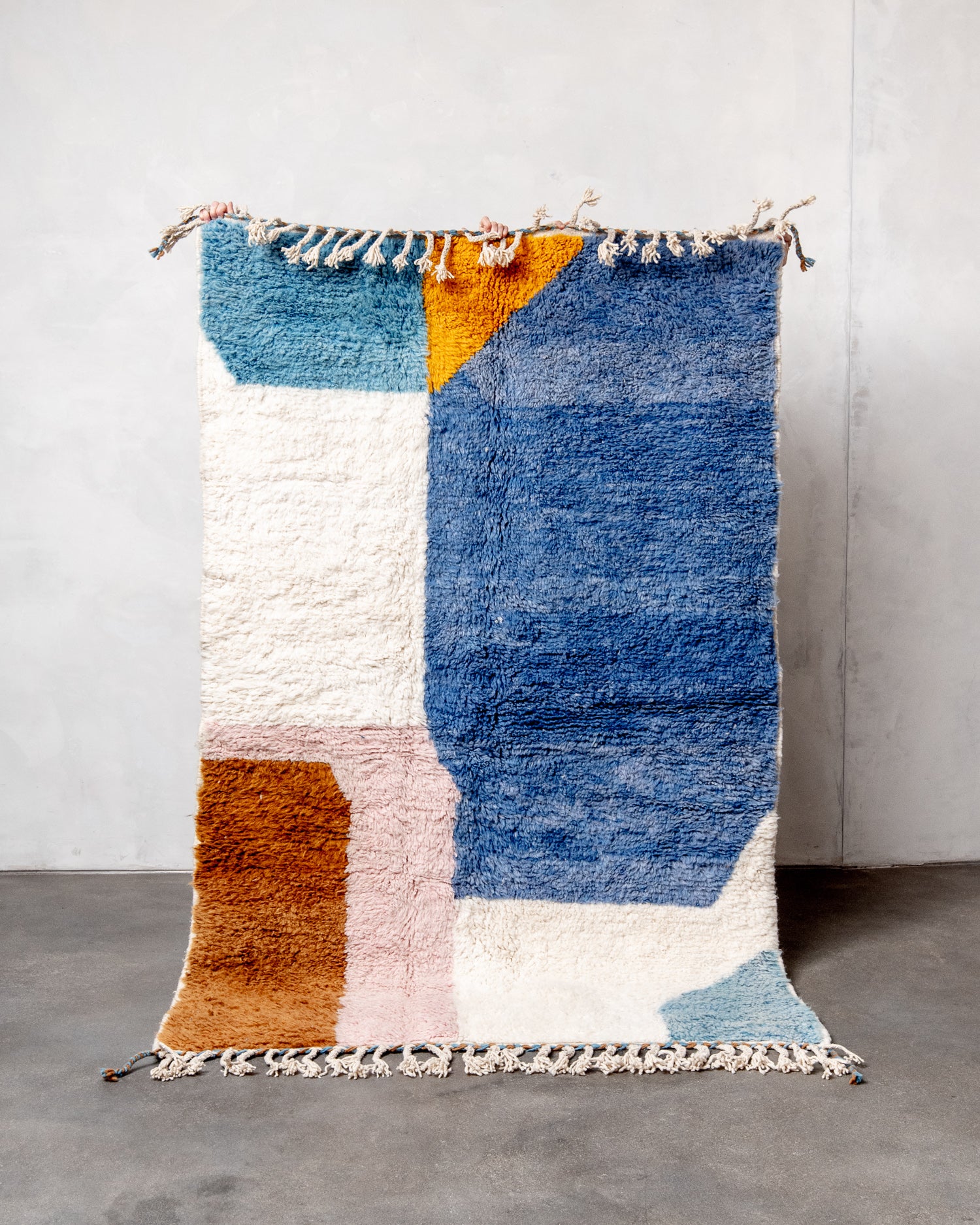 Modern, designer, handcrafted Berber rug from Morocco. Beniourain carpet with beautiful colours and patterns and fluffy wool texture.